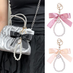พวงกุญแจตกแต่งรูปโบว์ไข่มุกริบบิ้นขนาดใหญ่น่ารักทำมือสีสันสดใสเครื่องประดับ DIY พวงกุญแจสวยงามสำหรับกระเป๋าสตางค์กระเป๋าเป้สะพายหลังรถ