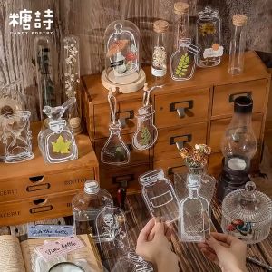 ดริฟท์ลายขวดสำหรับการเรียนหนังสือเด็ก และหนังสือเพิ่มเติม พร้อมด้วยหนังสือดอกไม้ประดิษฐ์โปร่งใส และดอกไม้หน้าบุ๊คมาร์ค