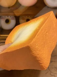 Slow Rebound Lava Toast Squishy Toy Stress Relief Creative Gift Large Squeeze Bread Design for All Ages Pure Color Popular Element