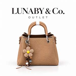 LUNABY & Co. Outlet beige handbag with wooden handles and flower charm.