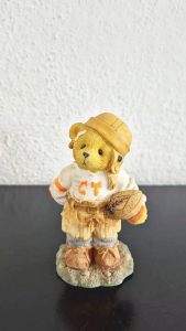 Cherished Teddies with a rugby and a basketball