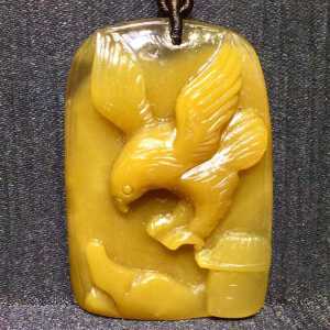 Pure natural yellow rabbit fur eagle pendant. Represents a bright future great prospects soaring to the heights. The design is extremely unique. The crystal is clear and transparent hand-carved lifelike and the texture is extremely smooth.
