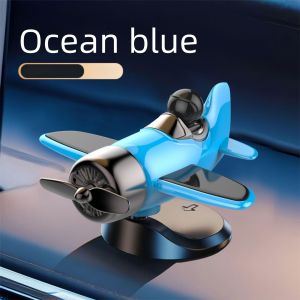 เครื่องประดับติดรถยนต์รูปเครื่องบินหมุนได้ด้วยพลังงานแสงอาทิตย์ 360 องศา ° เครื่องประดับตกแต่งภายในรถยนต์รูปเครื่องบินหมุนอัตโนมัติ