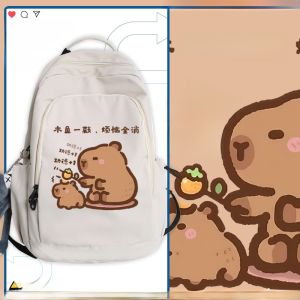 กระเป๋าเป้สะพายหลังผ้าไนลอนลายการ์ตูนสำหรับเด็กและเยาวชน กระเป๋าสะพายไหล่แบบลำลองสำหรับทั้งชายและหญิง กระเป๋าใส่หนังสือแบบอเนกประสงค์