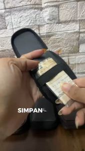 Dompet Kunci Kendaraan Mobil Mitsubishi dan Nissan Model Resleting Putar Terbaru