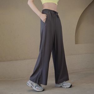 กางเกงโยคะขาบานสำหรับผู้หญิง กางเกงขายาวทรงหลวมสำหรับเต้นรำ กางเกงออกกำลังกายแฟชั่นสำหรับใส่กลางแจ้งในฤดูใบไม้ผลิและฤดูร้อน