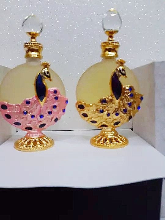 tinh dầu nước hoa dubai con công lớn 35ml , mẫu dùng thử chai bi lăn 10ml nhỏ ngọn