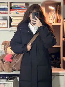 เสื้อแจ็คเก็ตผ้าฝ้ายทรงยาวสีดำสำหรับผู้หญิง สไตล์ลำลอง คลุมเข่า เสื้อโค้ทหนา ทรงหลวม แฟชั่นสำหรับผู้หญิง