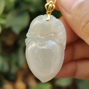 Semi Icy Yellow Natural Type A Jadeite Jade crafted with Monkey and Peach as Pendant with 18k clasp certificate weighs 6.97 grams measurement 35 * 21.2 * 5.5 mm (18kp91)