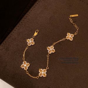 CAFFTI | Golden and Silver Color Tibetan Vajra Iris Clover Five Flower Womens Fashionable Bracelet