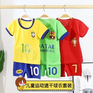 Kids Football Jersey Set with Real Madrid Brazil Portugal Qatar Airways and Rakuten Designs. White Yellow Pink Red Green and Black Kits. Blue and Yellow Trim. Suitable for Sports and Play.