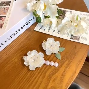 Kẹp tóc mái HOA SƠN TRÀ đính hạt châu trắng duyên dáng tinh tế dành cho nữ K207