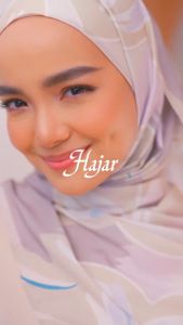 Alhumaira Hajar Long Shawl Velvet Satin Silk that is very soft and sleek Easy to style with stellar draping embellished with classic metal tag with non other signature neat baby seam.
