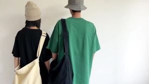 2025 ฤดูใบไม้ร่วงใหม่ฤดูใบไม้ผลิผูกกระเป๋าสะพายกระเป๋า Mailman กระเป๋าผ้าใบหนาและแข็งแรงผู้ชายกระเป๋าเครื่องมือวินเทจ