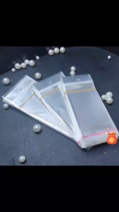 100pcs/Pack Opp plastic bag with sealant glue and Hanging hole