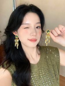 Vintage Long Tassel Women's Earrings: Copper Alloy Dangle Studs & Elegant Hong Kong Style
