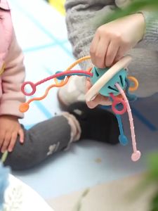 Đồ Chơi Silicon Bạch Tuộc Rút Dây Cho Bé Gặm Nướu Rèn Luyện Vận Động Tinh