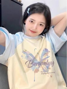 เสื้อยืดแขนสั้นผู้หญิงฤดูร้อน สีฟ้าฟ้าอ่อน ทรงหลวม คอกลม ลายการ์ตูน เส้นใยไตรอะซิเตท 100% ความยาวปกติ