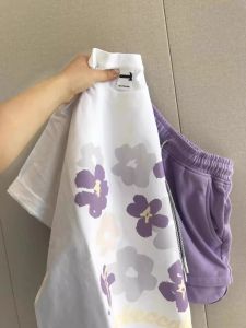 เสื้อยืดแขนสั้นผู้หญิงผ้าฝ้ายแท้พิมพ์ลายดอกไม้สไตล์ญี่ปุ่นและฮ่องกง ทรงหลวม ทรงไหล่ ทรงหลวม ทรงหลวม ทรงหลวม