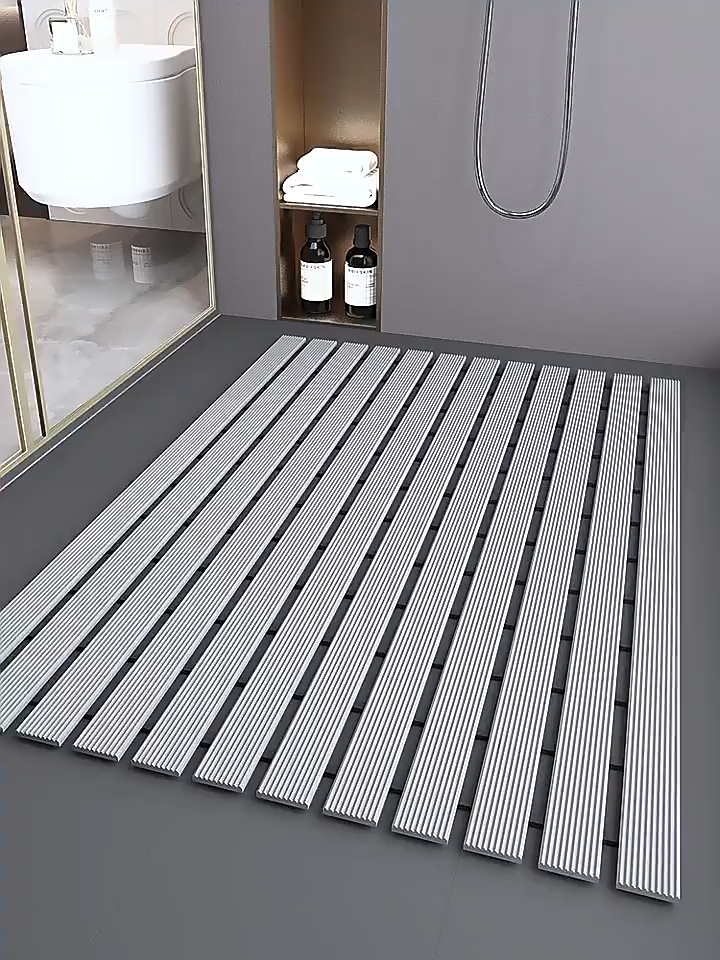 Floating non-slip shower mat for bathrooms With high open drainage design it eliminates water accumulation and dampness It is durable resistant to wear and tear and does not get moldy Ideal for elderly and children to use in the bathroom for safety and sl