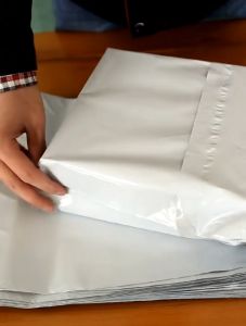 ( 100 PCS ) Polymailer Plastik Packing Olshop Lem Perekat Kuat Ukuran 23x33cm / 40x24cm / 50x33cm