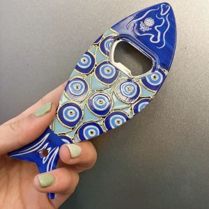 1PC Fish-Shaped Acrylic Fridge Magnet with Blue Eye Pattern And Gold Foil Embossed Texture Dual Purpose Bottle Opener