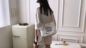 -Candyy.case-กระเป๋าผ้าสะพายข้าง ใบใหญ่​จุของได้เยอะ สกรีนลายYOUTH ผ้าแคนวาส สำหรับผู้ชาย​และผู้หญิง มีสองสี #BAG07