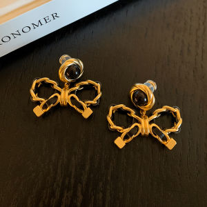 CAFFTI | Leather Bow Earrings Black and Gold Contrast