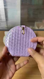 Multi-color round woven mini womens coin purse with zipper pocket pendant