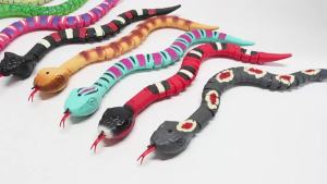 Remote Control Snake Toy with USB Charger and Interactive Crawling Action Realistic Silver Ringed Snake Design