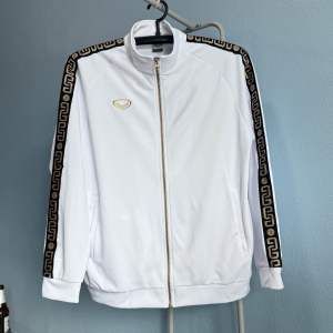 Grand Sport เสื้อวอร์มแกรนด์สปอร์ต WARM JACKET 016-389