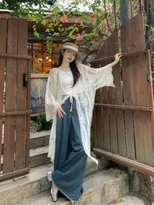 เสื้อเชิ้ตแขนยาวป้องกันแสงแดดสไตล์วันหยุดสำหรับผู้หญิงในช่วงฤดูร้อน เสื้อคาร์ดิแกนเปิดไหล่แบบบาง ปักลายหนัก ทรงหลวม แขนยาว ปกโปโล