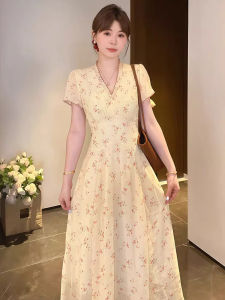 SUSIEYUAN | กระโปรงทรงเอผ้าโพลีเอสเตอร์และยางยืดสำหรับผู้หญิงในฤดูร้อน กระโปรงทรงเอคอวีลายดอกไม้สีเหลืองสวยงาม เอวเข้ารูป กระโปรงทรงเอสำหรับผู้หญิง