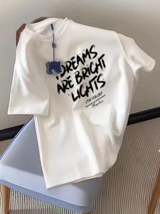 เสื้อยืดแขนสั้นผ้าฝ้ายแท้ทรงหลวมสำหรับผู้ชาย ทรงหลวม สไตล์สตรีท สไตล์อเมริกัน เทรนด์แฟชั่น เสื้อยืดคอกลมลายเรขาคณิต