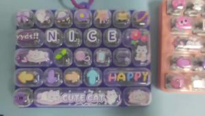 Bandai | 4 colors of creative cute and fun 26 key stress relieving keychain bag pendant stress relieving toy