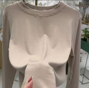 เสื้อยืดคอกลมแขนยาวทรงสลิมฟิตสำหรับผู้หญิง เสื้อชั้นในทรงเข้ารูป ทรงหลวม สีพื้น ฤดูใบไม้ร่วง 2024