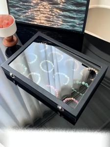 Black 12-slot jewelry box with glass lid for bracelets and necklaces