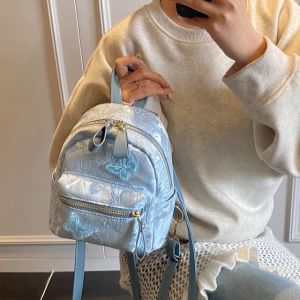 กระเป๋าเป้สะพายหลังนักเรียนสไตล์ย้อนยุคสำหรับผู้หญิง กระเป๋าใส่หนังสือแบบลำลองสำหรับเดินทาง กระเป๋าสะพายไหล่ขนาดเล็กแบบลำลองสำหรับผู้หญิง