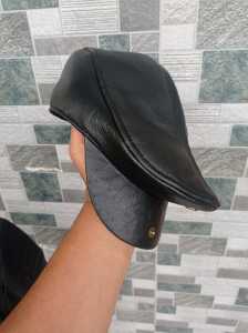 Topi pet kulit domba model pedoras produksi kota garut jawa barat