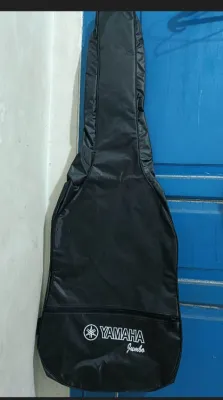 Tas gitar jumbo plus gagang samping
