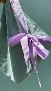 กระเป๋าลูกฟู 2สี สายผูกโบว์ 🦕 - กระเป๋าลูกฟูที่มีความสามารถในการรักษาสุขภาพด้วยสายผูกโบว์