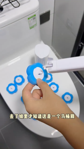 Disposable Toilet Brush Wall Mount with Cleaning Solution for Stain and Odor Removal. Features include stain removal surface protection and odor elimination. Suitable for bathroom cleaning.
