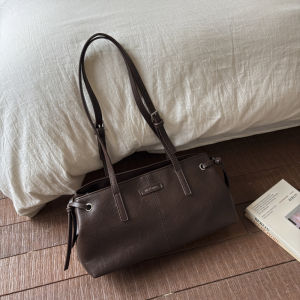 Retro Coffee Oil Wax Leather French Bread Bag Womens Commuter Single Shoulder Bag Soft Handbag Daily Use Pure Color Pattern