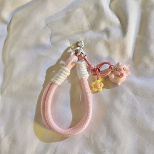 สร้อยข้อมือหนังสือเล่มสั้นสไตล์เกาหลี INS พร้อมโทรศัพท์มือถือ ห้อยรูปหมูสีชมพูลายดอกไม้ ทำด้วยผ้าไนลอน เข็มขัดถัก สายรัดข้อมือแบบถือได้
