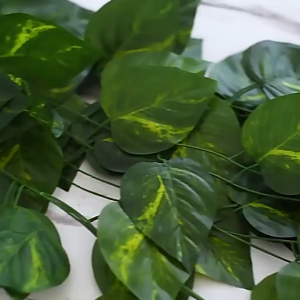 1pack/12pcs Daun Rambat Plastik Dekorasi Dinding Daun Rumput Sintetis Pagar Artificial 24m per