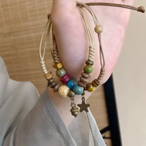 สร้อยข้อมือแฟชั่นวินเทจกำไลลูกปัดเซรามิกชาติพันธุ์สายทอตกแต่งข้อมือสวยงามเครื่องประดับเก๋ไก๋สไตล์โบฮีเมียนของขวัญสำหรับผู้หญิง