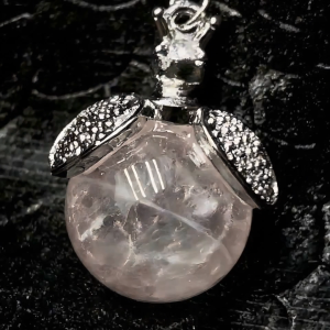 A versatile pink crystal pendant necklace with a stylish design