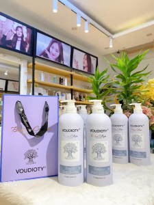 Cặp dầu kiềm dầu chống rụng phục hồi bóng mượt Biotin Collagen Voudioty màu tím 1000ml