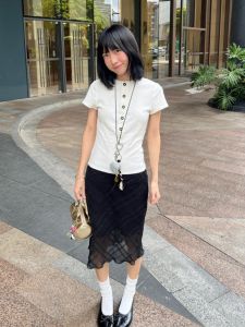 กระโปรงทรงเอผ้าชิ้นเดียวลายสก็อตเอวต่ำสำหรับผู้หญิง ฤดูร้อนปี 2025 กระโปรงทรงตรงสีดำ สไตล์วินเทจ ทรง H ความยาวปานกลาง