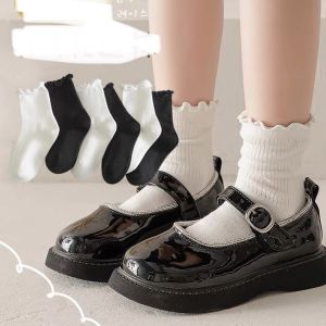 Tất gân cao cổ nhún bèo cho bé gái màu trơn